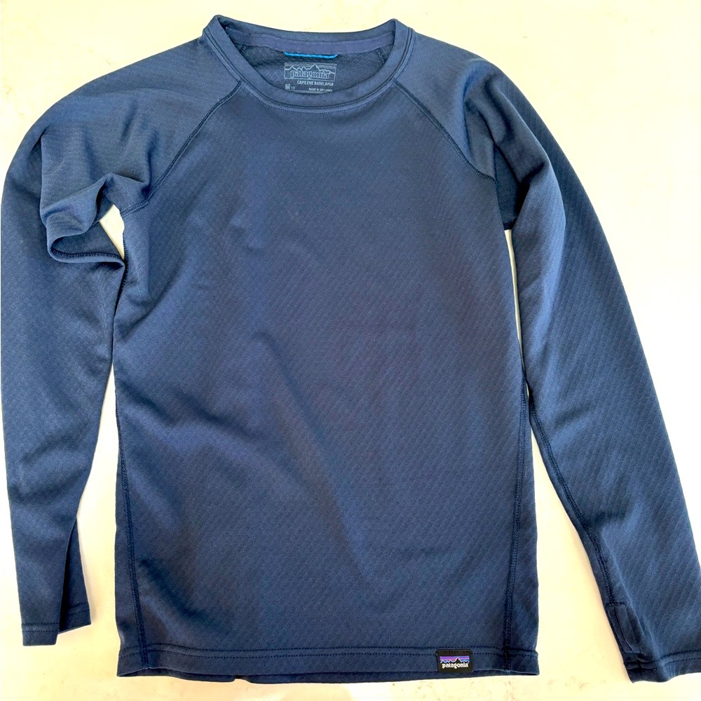 Kids size 10 medium. Capilene base layer shirt by Patagonia.